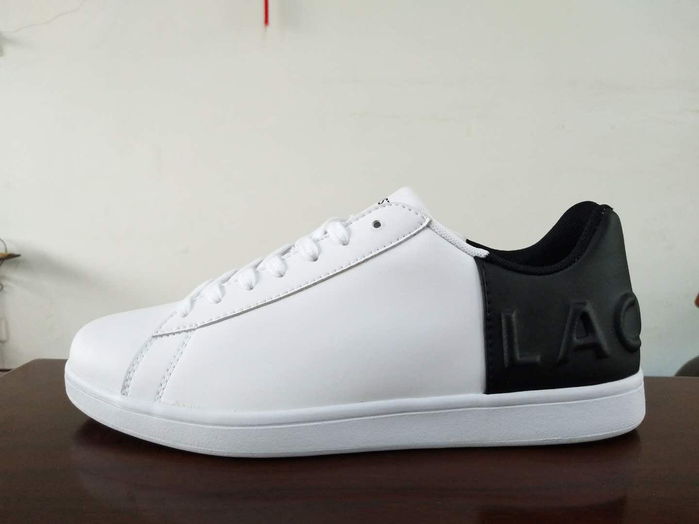 Lacoste White/Black Carnaby Crested Logo Sneaker - Obeezi